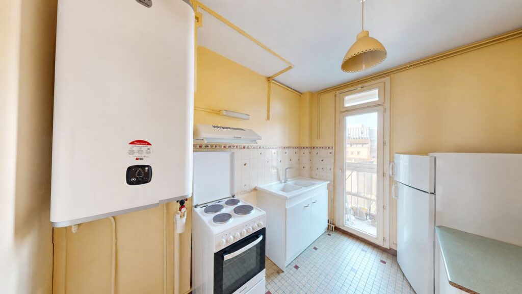 T3 DE 57M2 AVEC ASCENSEUR, BALCON ET CAVE- 19 RUE BAYARD