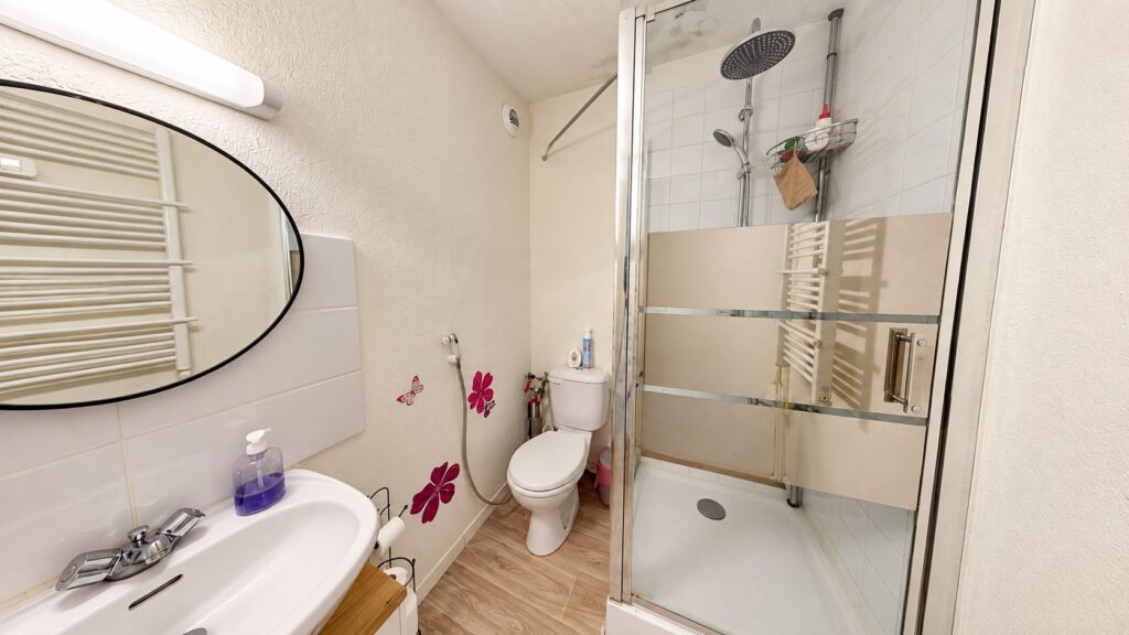 Appartement À Vendre T4 loué de 89 m² avec balcon, parking et cave